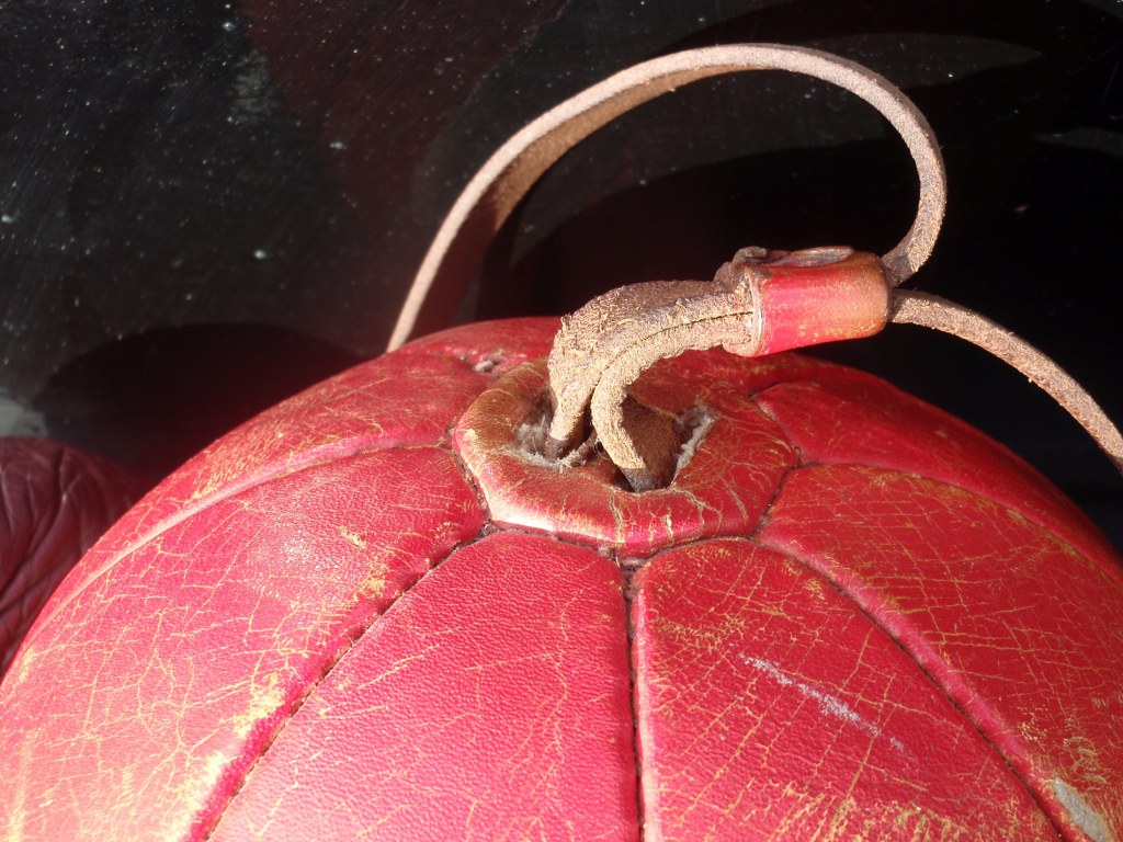 Vintage leather boxing ball with two pair boxing gloves