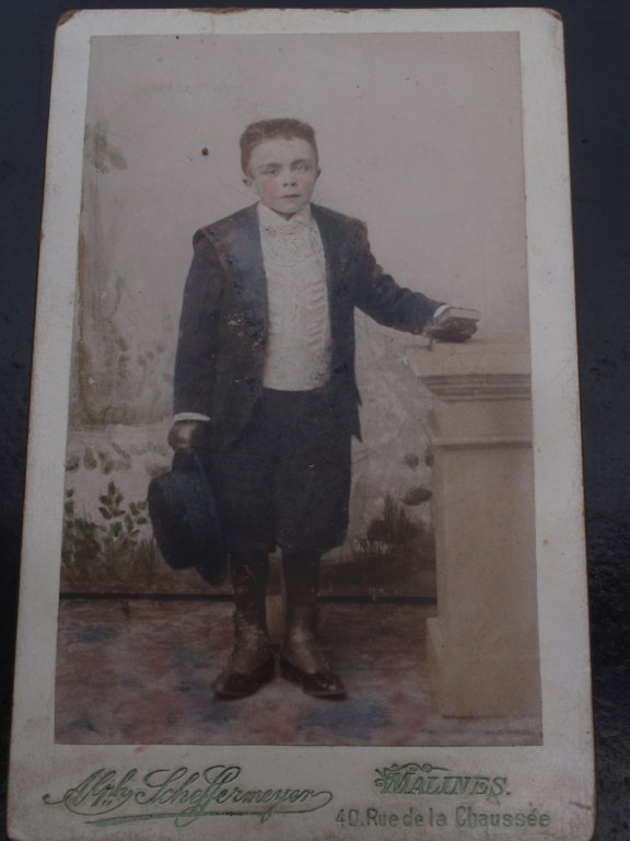 Early hand coloured photo of boy from Mechelen/Malines
