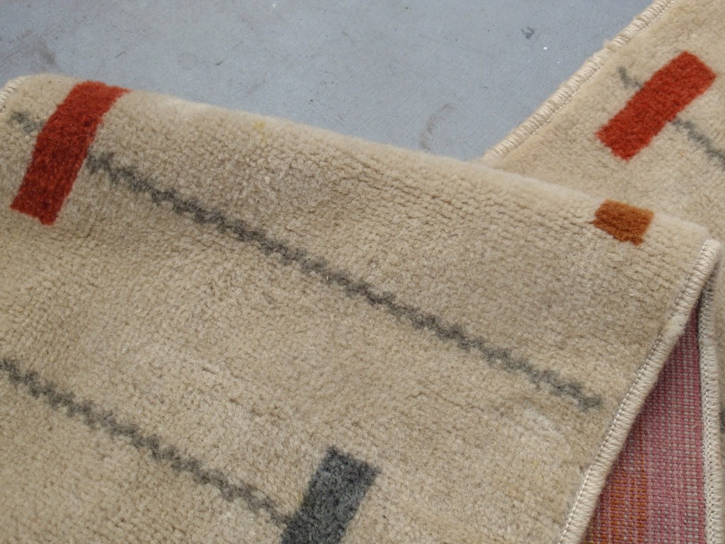 Small Dutch carpet with geometrical motifs