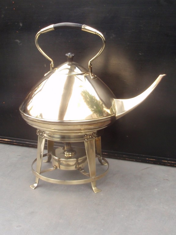 Large brass kettle on stove by Eisenloeffel