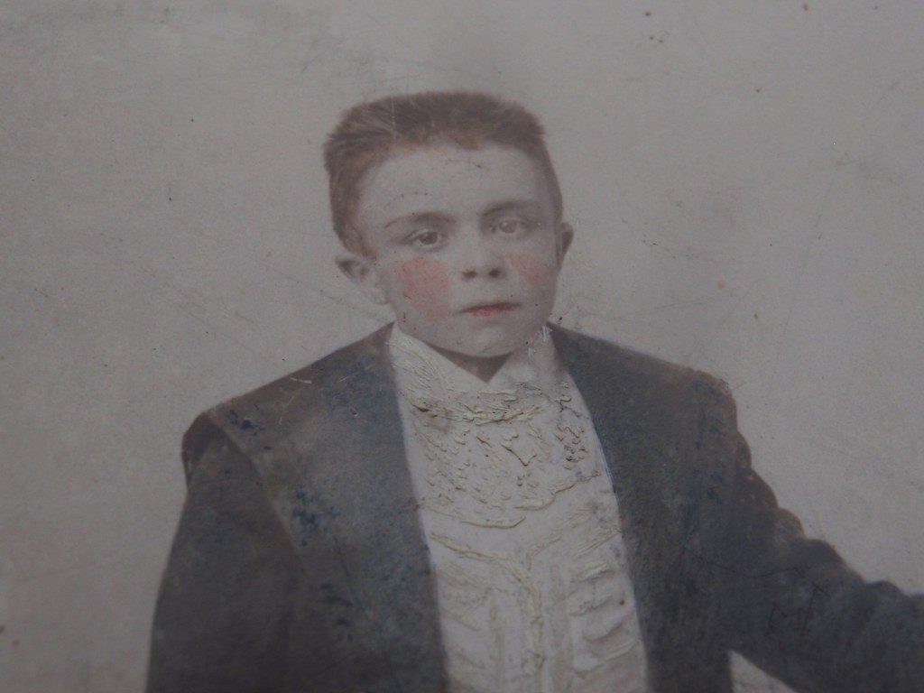 Early hand coloured photo of boy from Mechelen/Malines