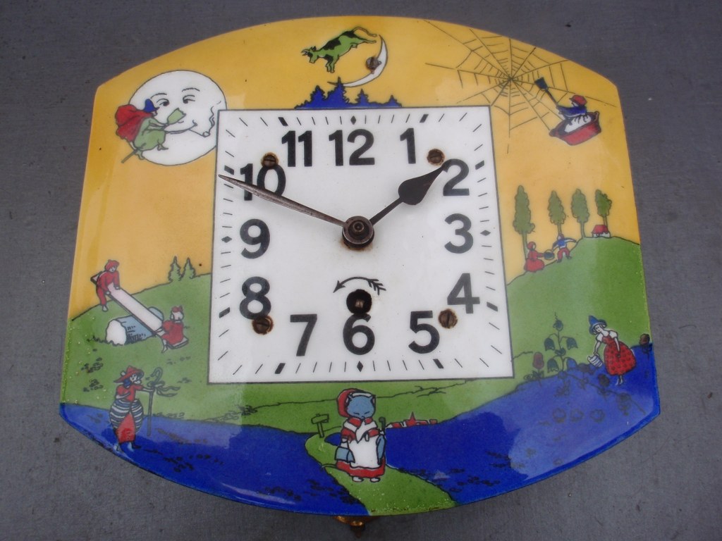 Antique German Nursery enamel wall clock